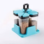 Shopkwik 4 Spice of Sprinkle Set - Plastic Multipurpose Revolving Spice Rack Jars with Tray, 4 Bottle Space Saver Condiments Sprinkle for Masala, Pickle, Dry Fruit, Sugar, Salt